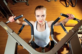 woman doing a pull up woman doing a pull up