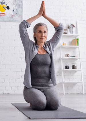 healthy aging woman doing yoga