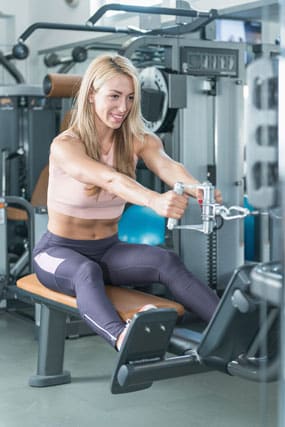 rowing machine workout woman