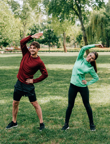 too busy to work out couple in park